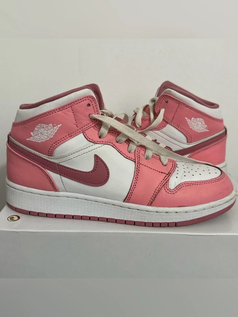 Jordan 1 Kids Pink and White Mid-Top Sneakers with Dark Pink Swoosh